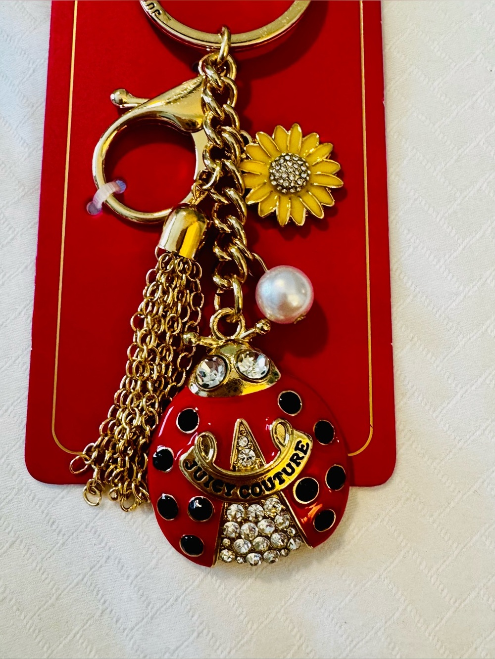 Juicy Couture Red and Gold Ladybug Keychain with Yellow Sunflower